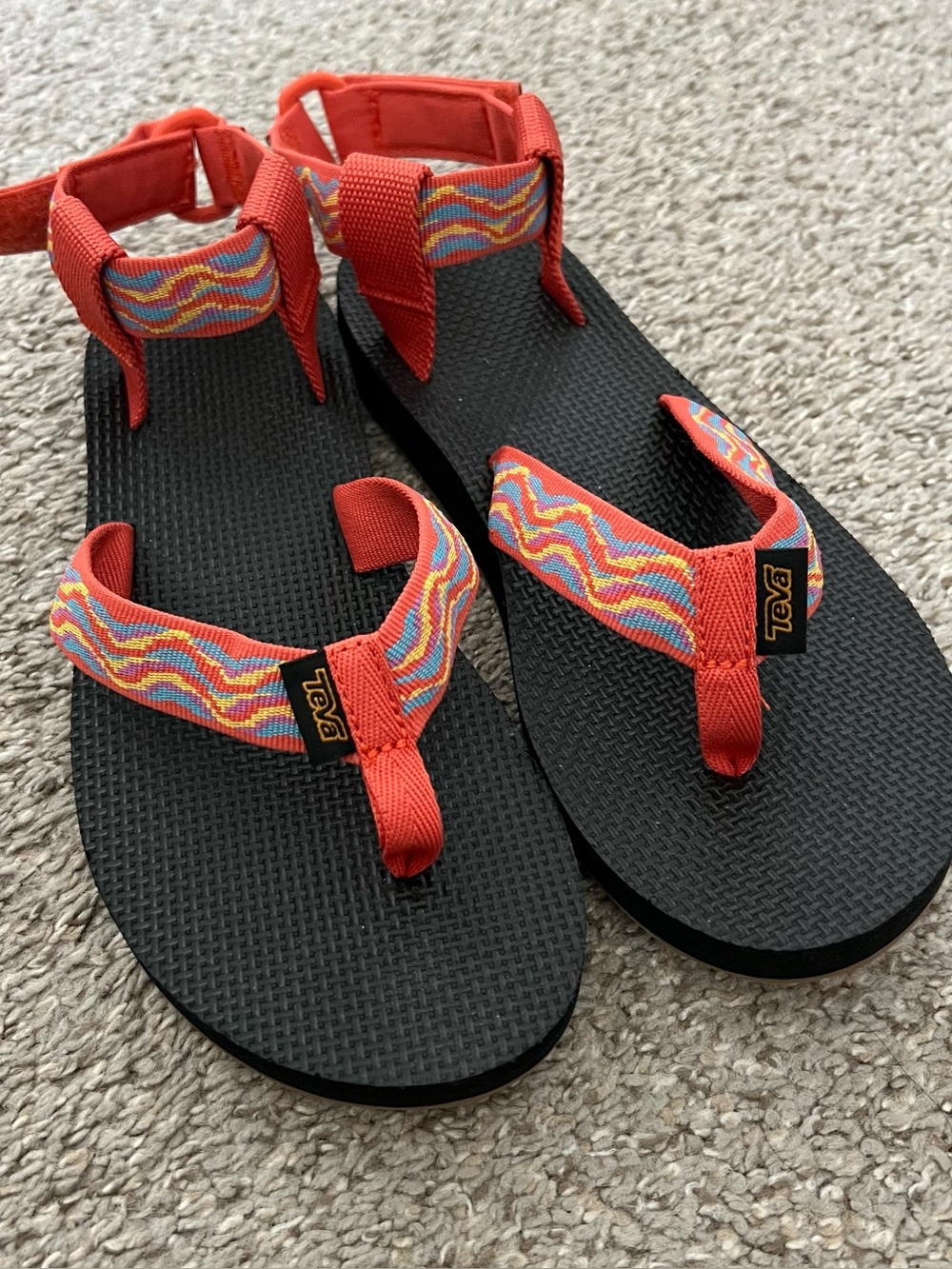 Teva Women's Black Sandals with Orange and Multicolor Wave Straps Size 6